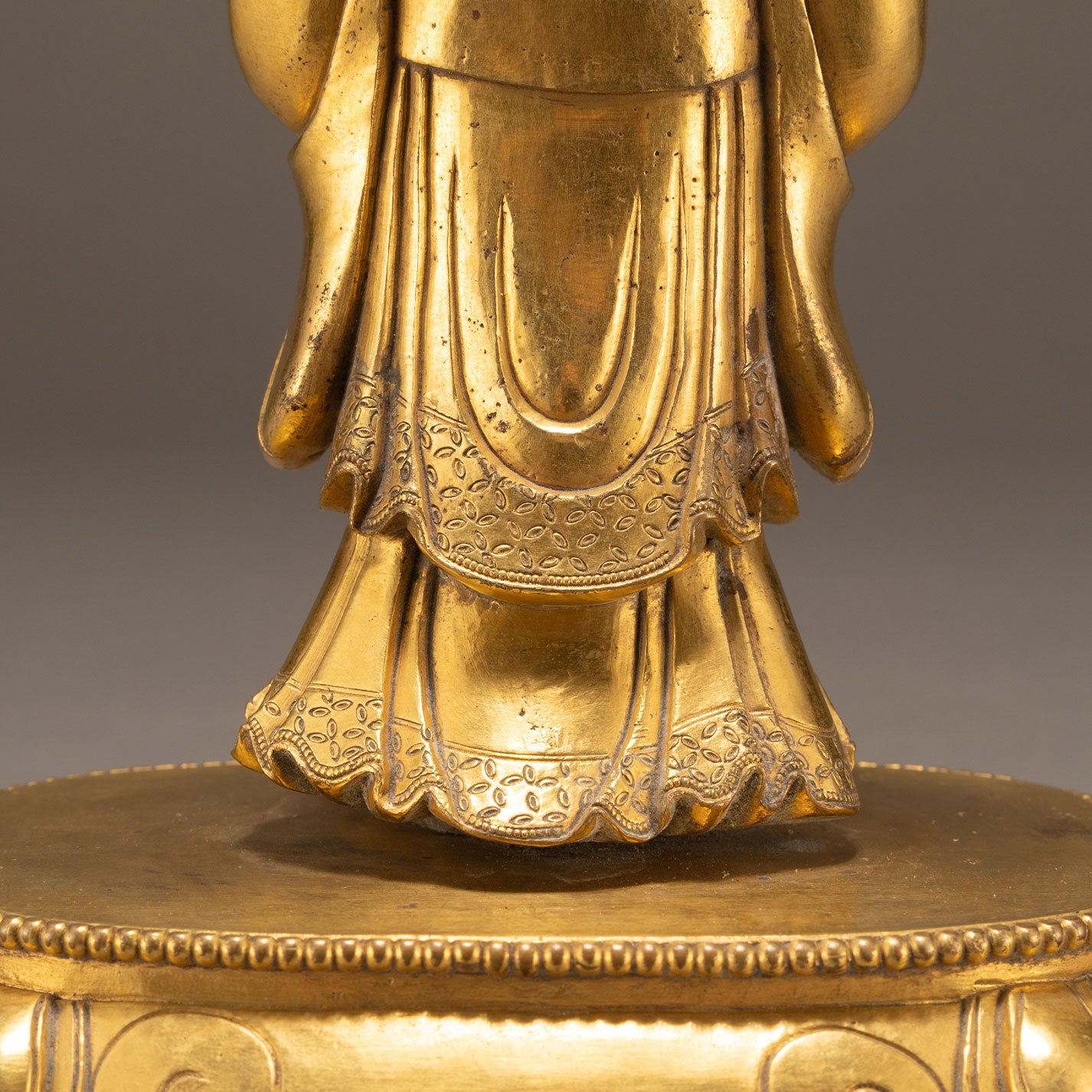 Bronze and gold statue of a guardian deity