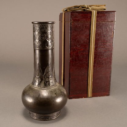 Antique bronze straight-necked bottle with banana leaf pattern