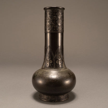 Antique bronze straight-necked bottle with banana leaf pattern