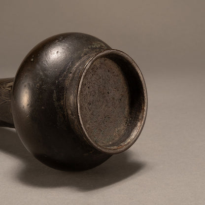 Antique bronze straight-necked bottle with banana leaf pattern