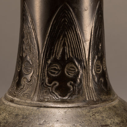 Antique bronze straight-necked bottle with banana leaf pattern