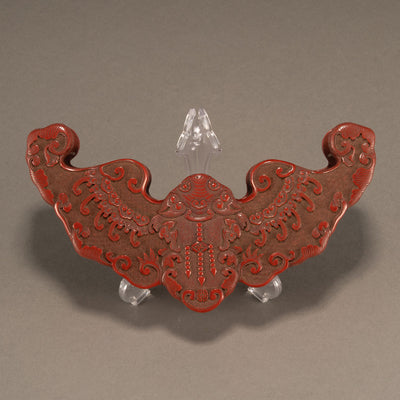 Red bat-shaped lid box