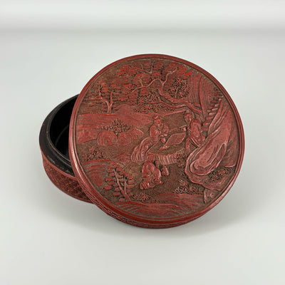 Carved Red Lacquer Box with Figure Design