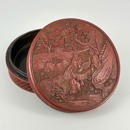 Carved Red Lacquer Box with Figure Design
