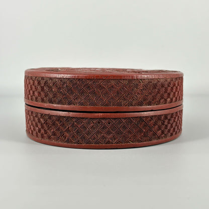 Carved Red Lacquer Box with Figure Design