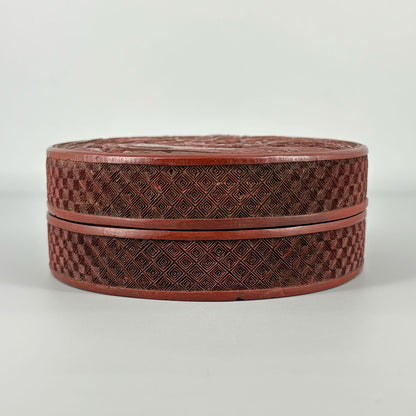 Carved Red Lacquer Box with Figure Design