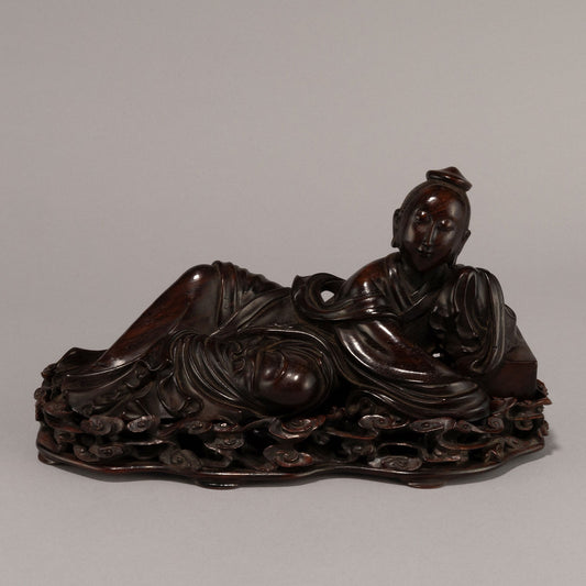 Rosewood Statue of a Reclining Tennyo