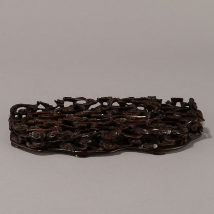 Rosewood Statue of a Reclining Tennyo