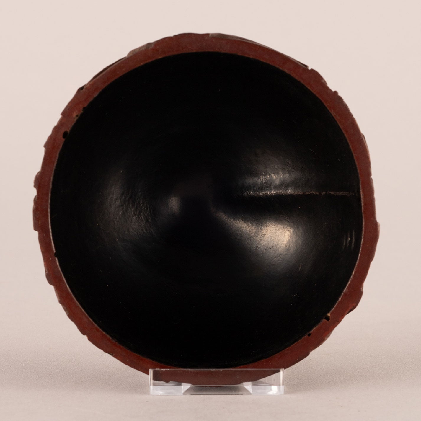 Carved red peach-shaped box with lid