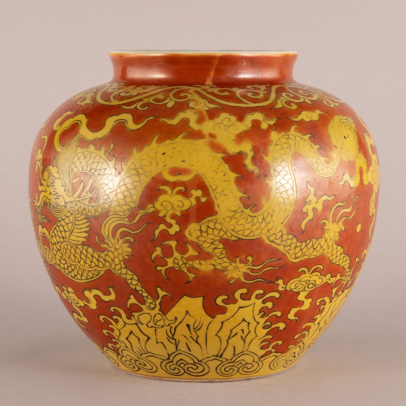 Red background with yellow dragon pattern can