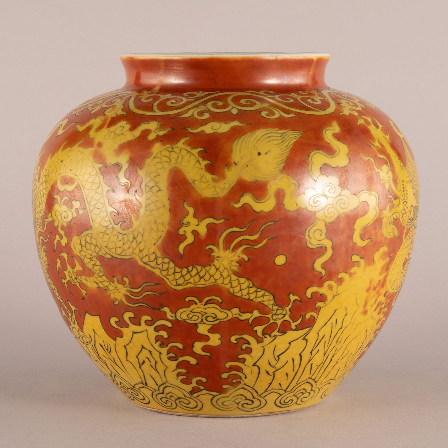 Red background with yellow dragon pattern can