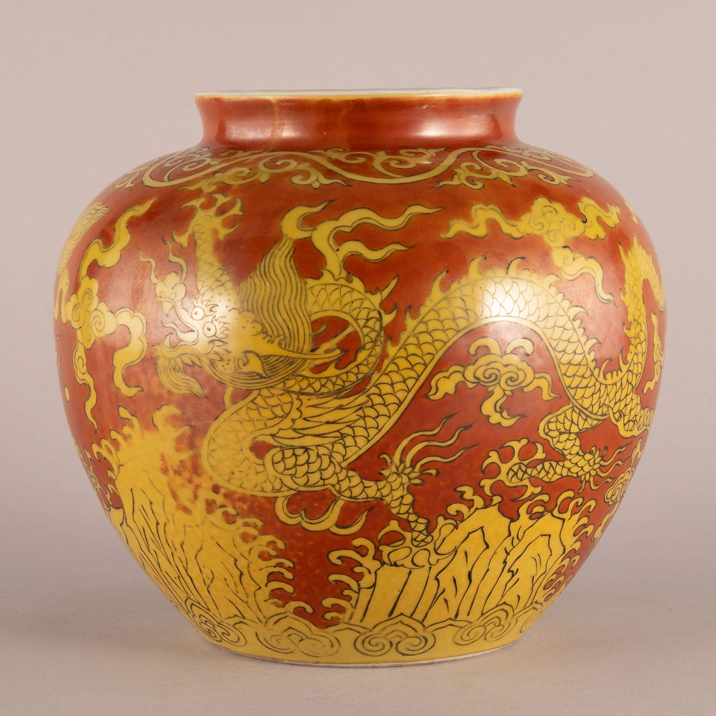 Red background with yellow dragon pattern can