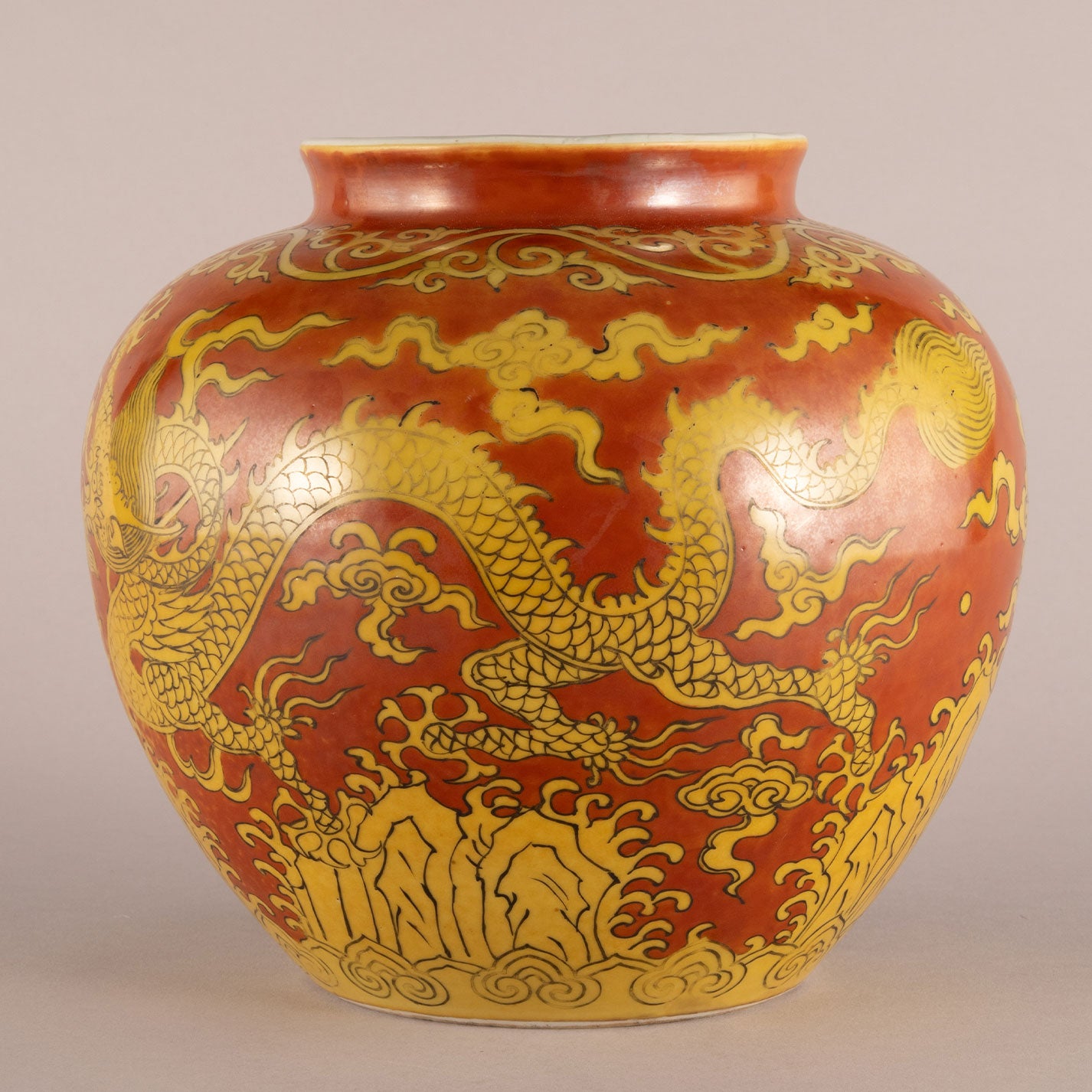 Red background with yellow dragon pattern can