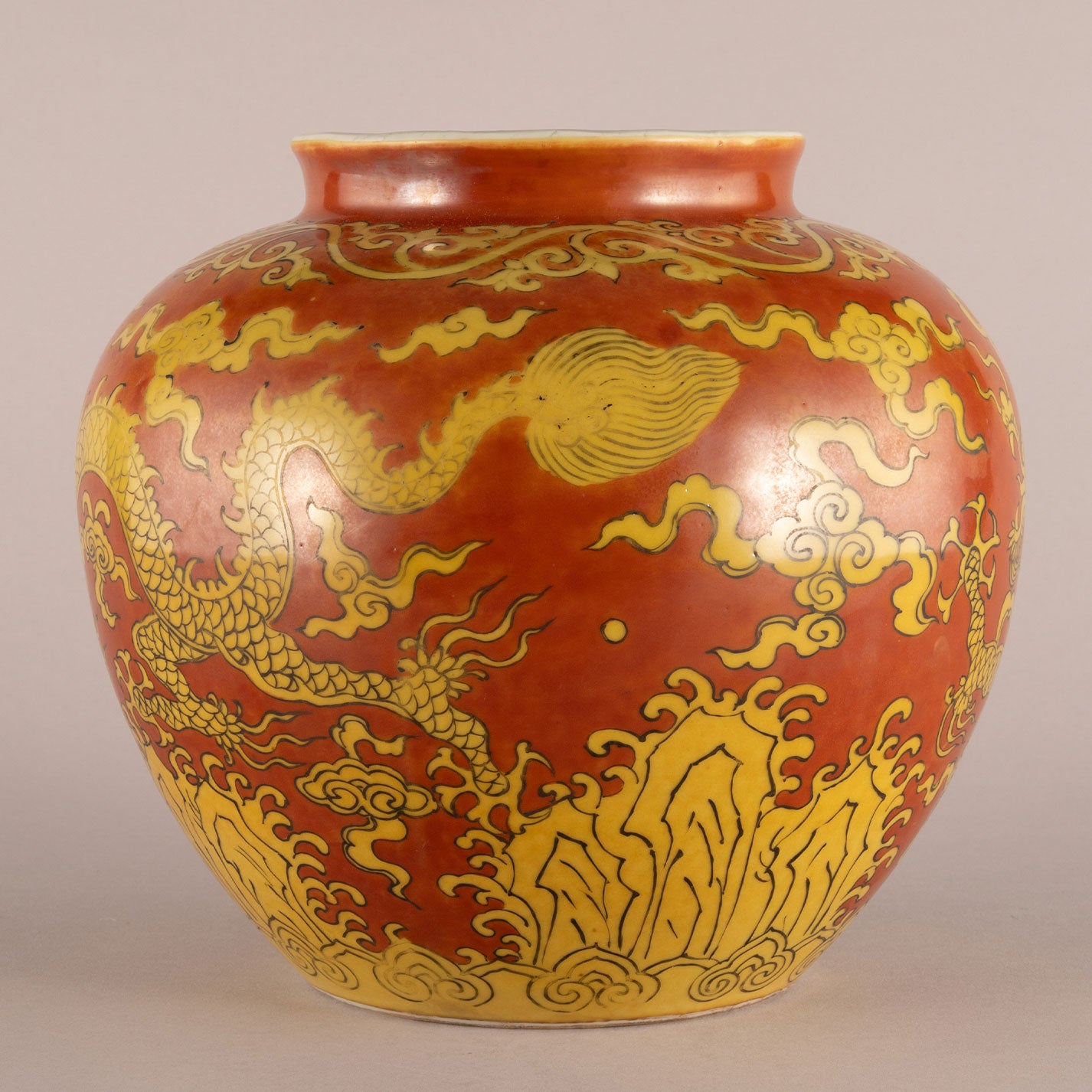 Red background with yellow dragon pattern can