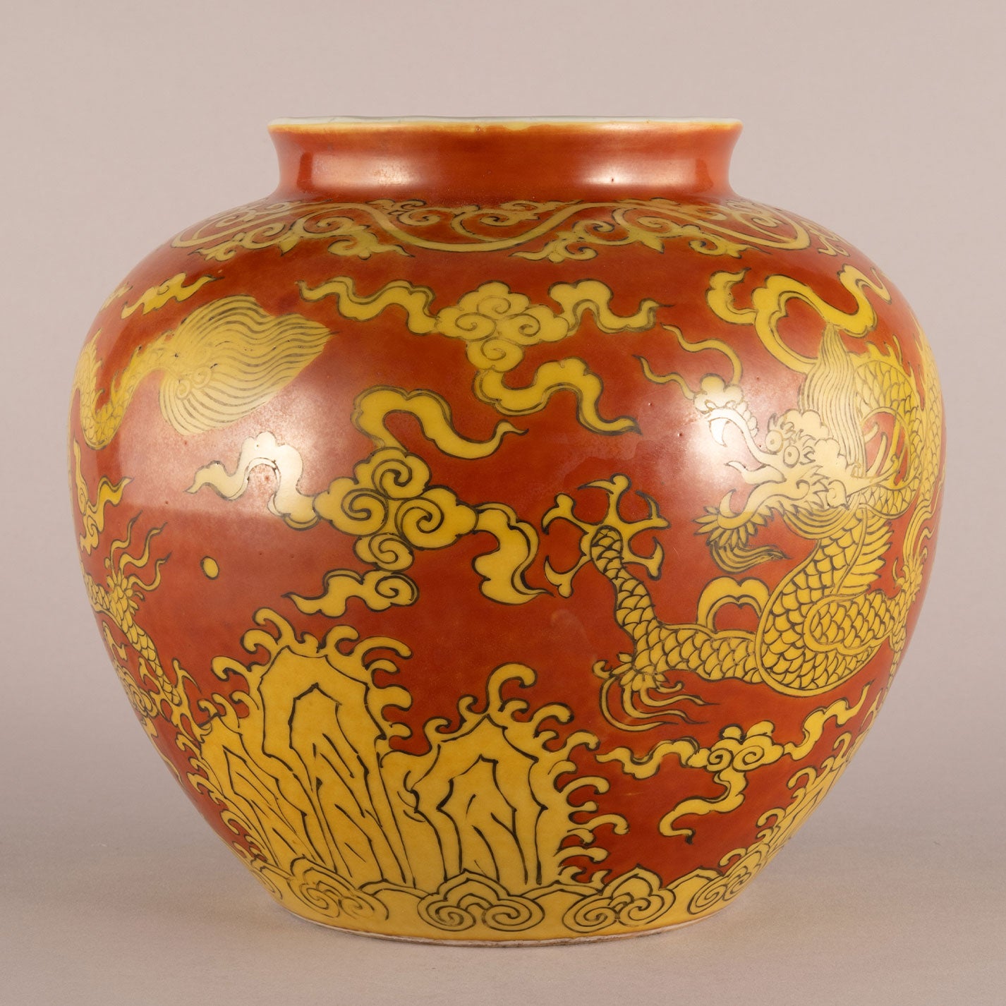 Red background with yellow dragon pattern can