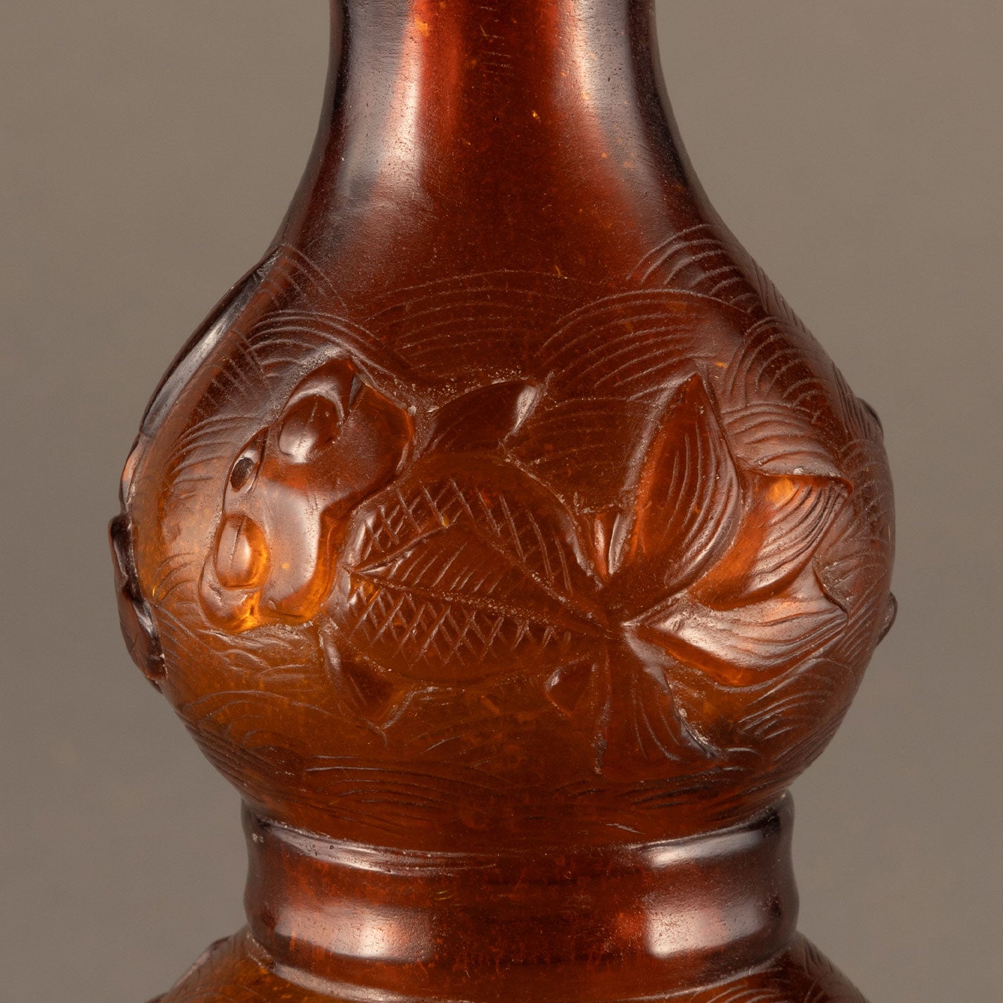 Reed-shaped bottle