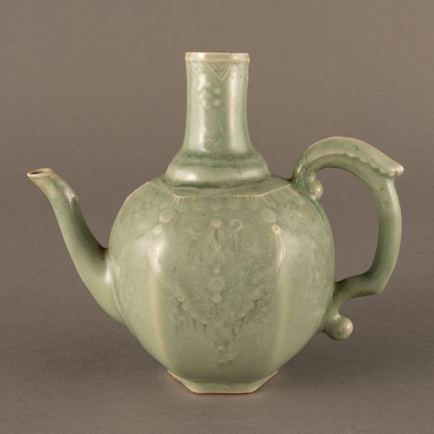 Celadon hexagonal water pitcher with garland pattern