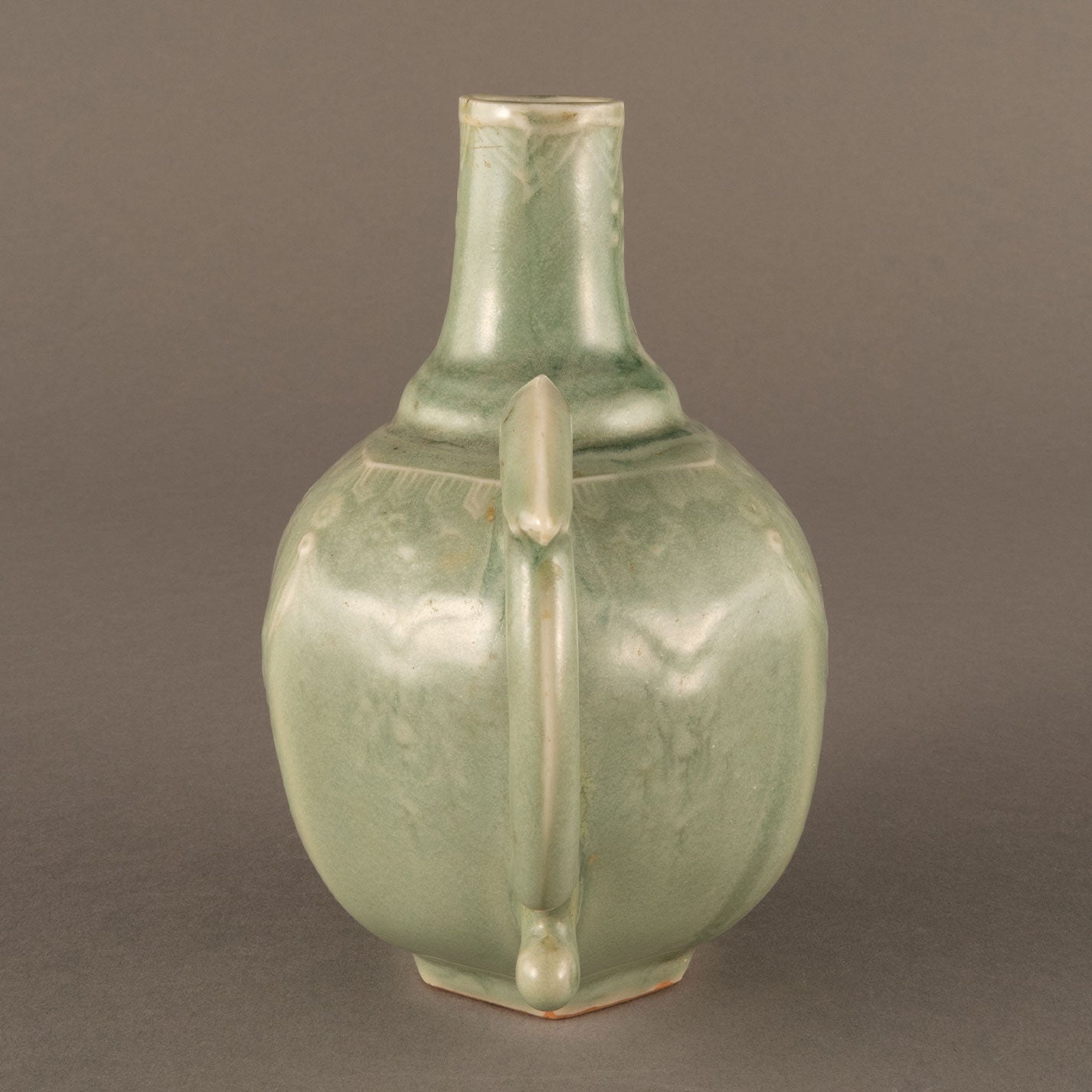 Celadon hexagonal water pitcher with garland pattern