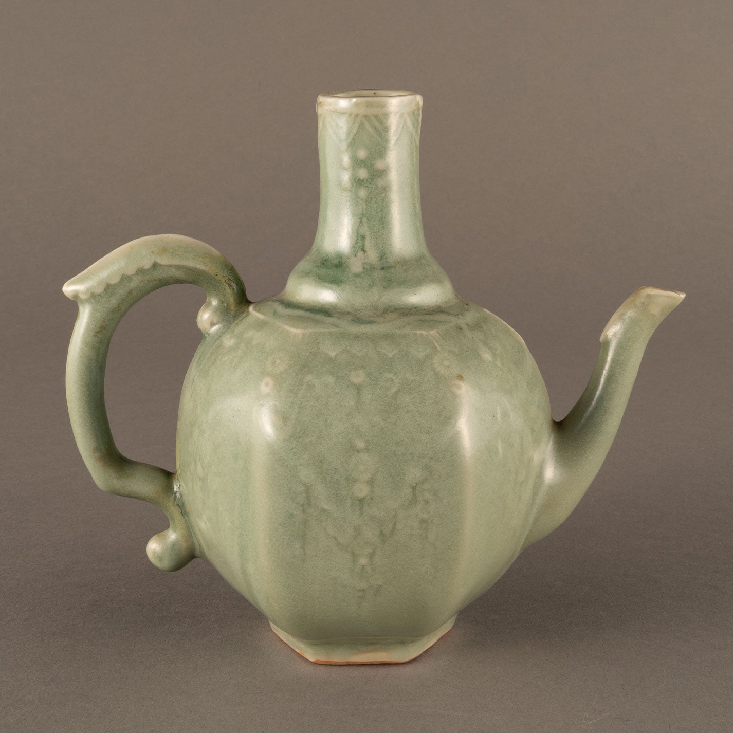 Celadon hexagonal water pitcher with garland pattern