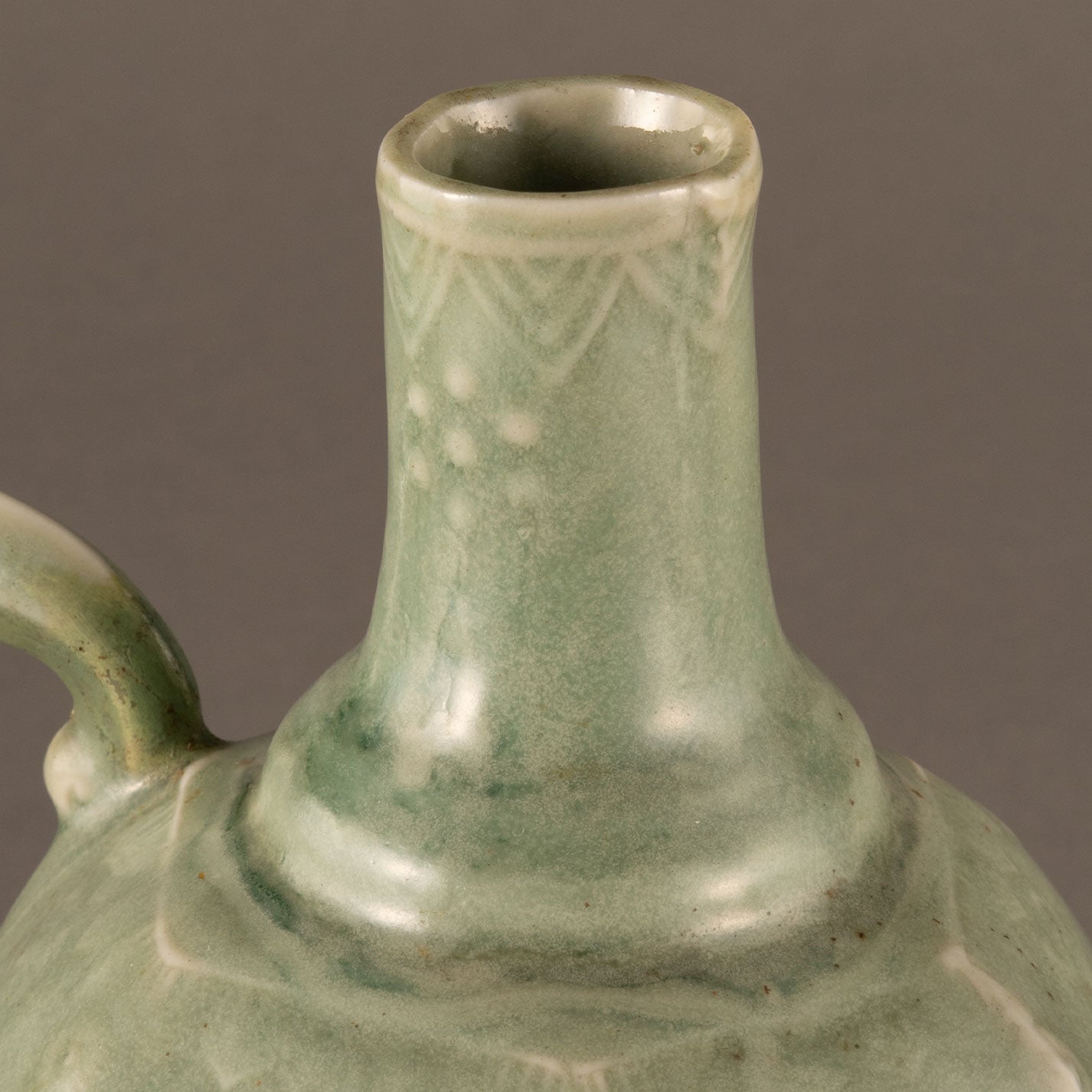 Celadon hexagonal water pitcher with garland pattern