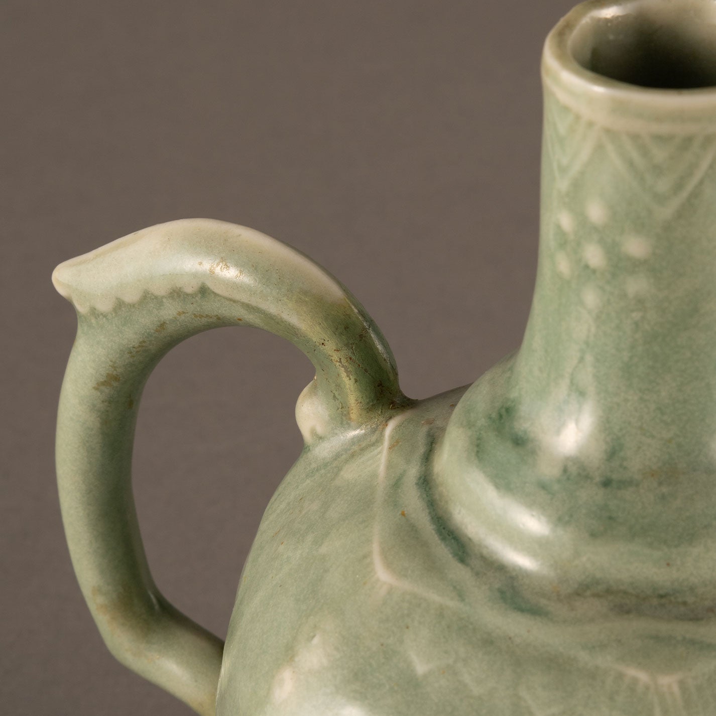 Celadon hexagonal water pitcher with garland pattern