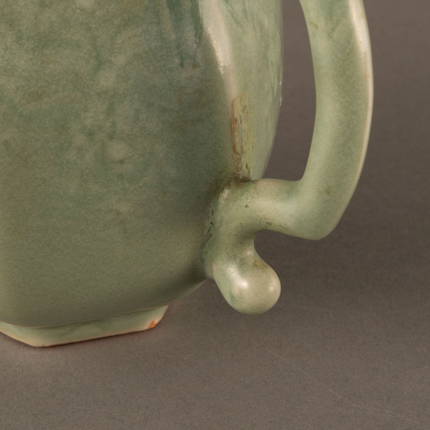 Celadon hexagonal water pitcher with garland pattern