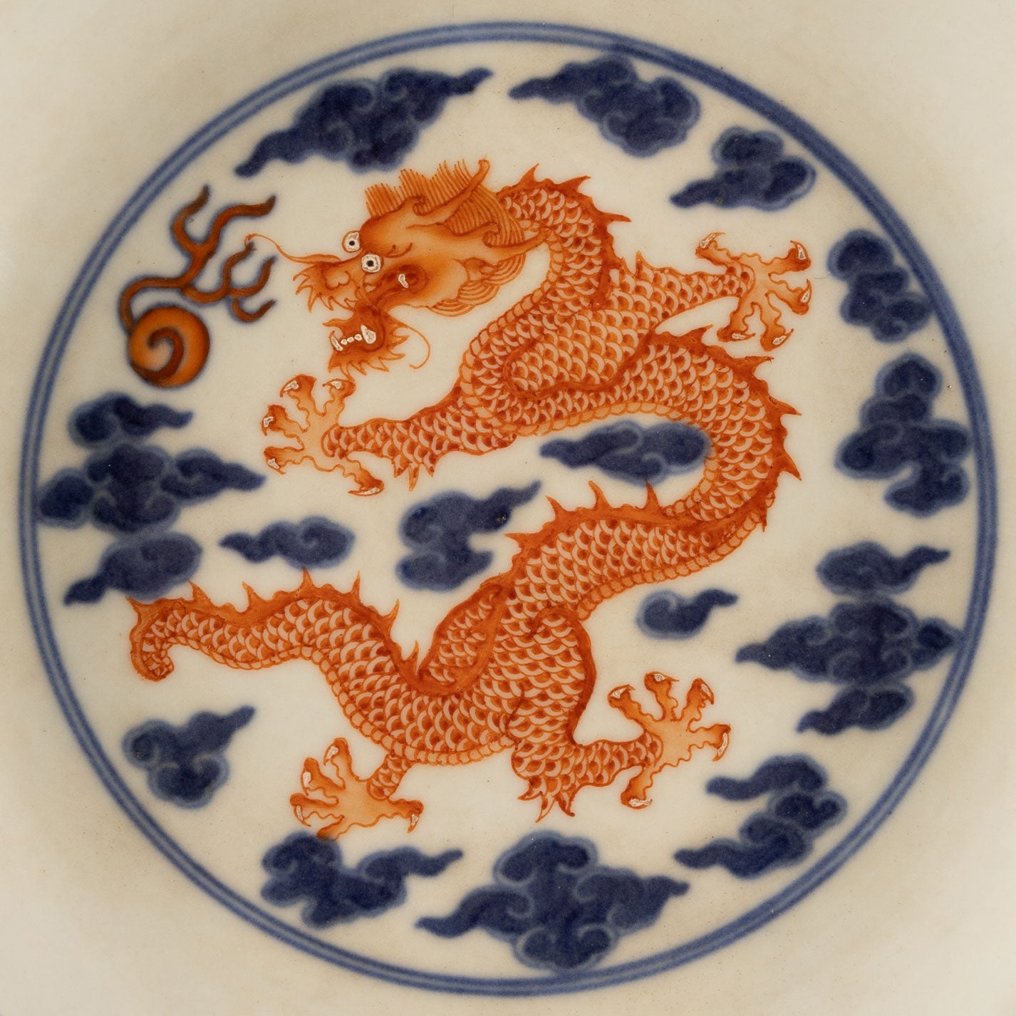 Blue and white sumi red dragon pattern plate