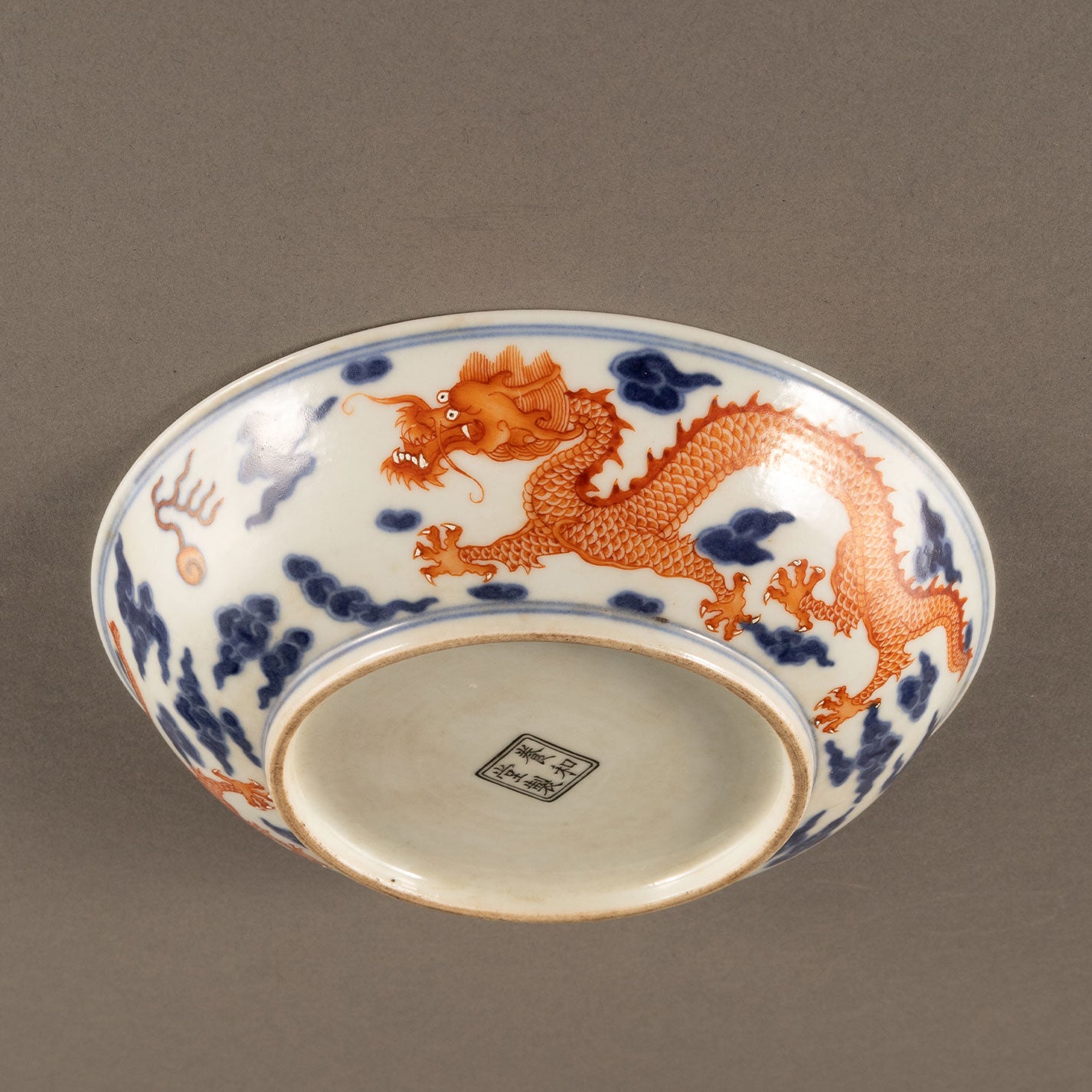 Blue and white sumi red dragon pattern plate