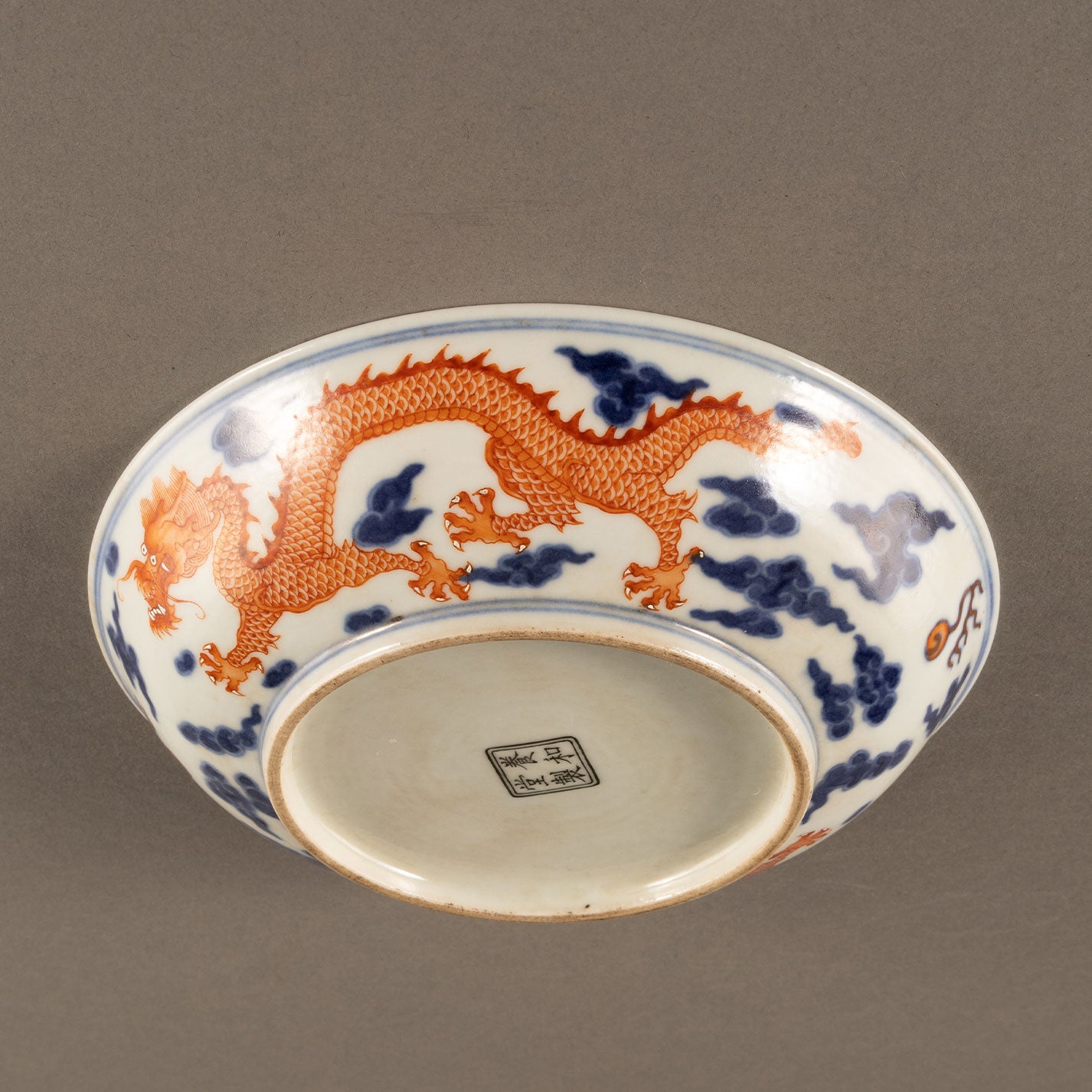 Blue and white sumi red dragon pattern plate