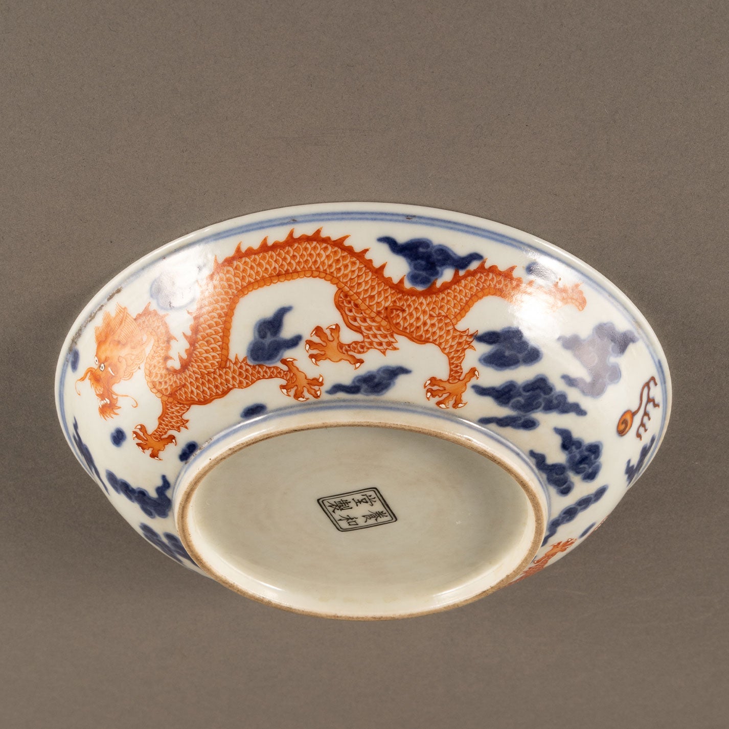 Blue and white sumi red dragon pattern plate