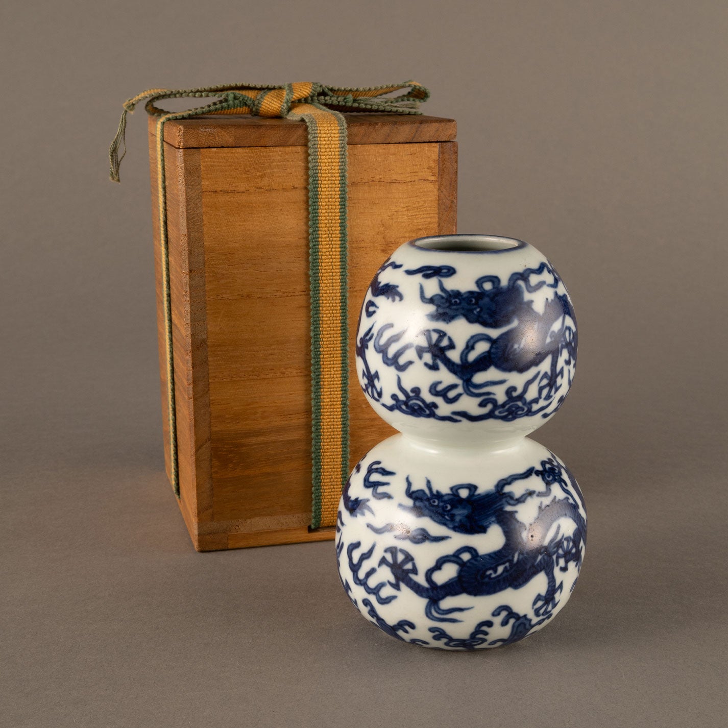 Blue and white cloud and dragon motif holly vase