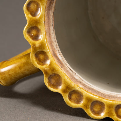 黄釉竹節形茶壺