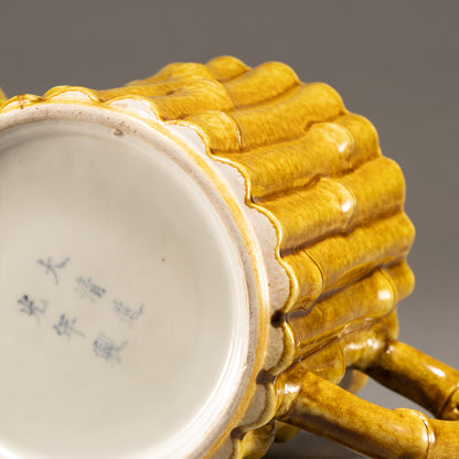 黄釉竹節形茶壺